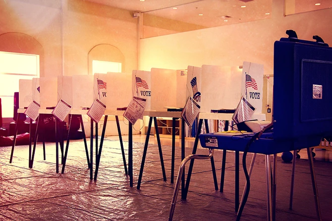 Voting booths Credit Stephen Velasco via Flickr CC BY NC 20 filter added CNA